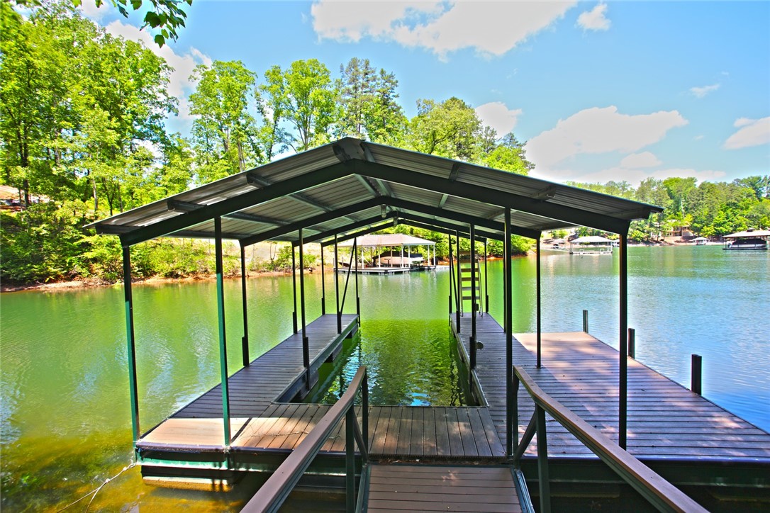 Lot 114 Harbor Point Seneca, SC 29672 - Photo 21 of 46 Boathouse with covered slips provides easy access to serene waters.