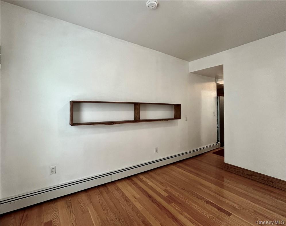 6 Cottage Street, Unit 2 Warwick, NY 10990 - Photo 9 of 12 a view of an empty room and wooden floor