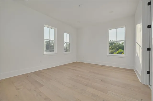 a view of a room with a large window
