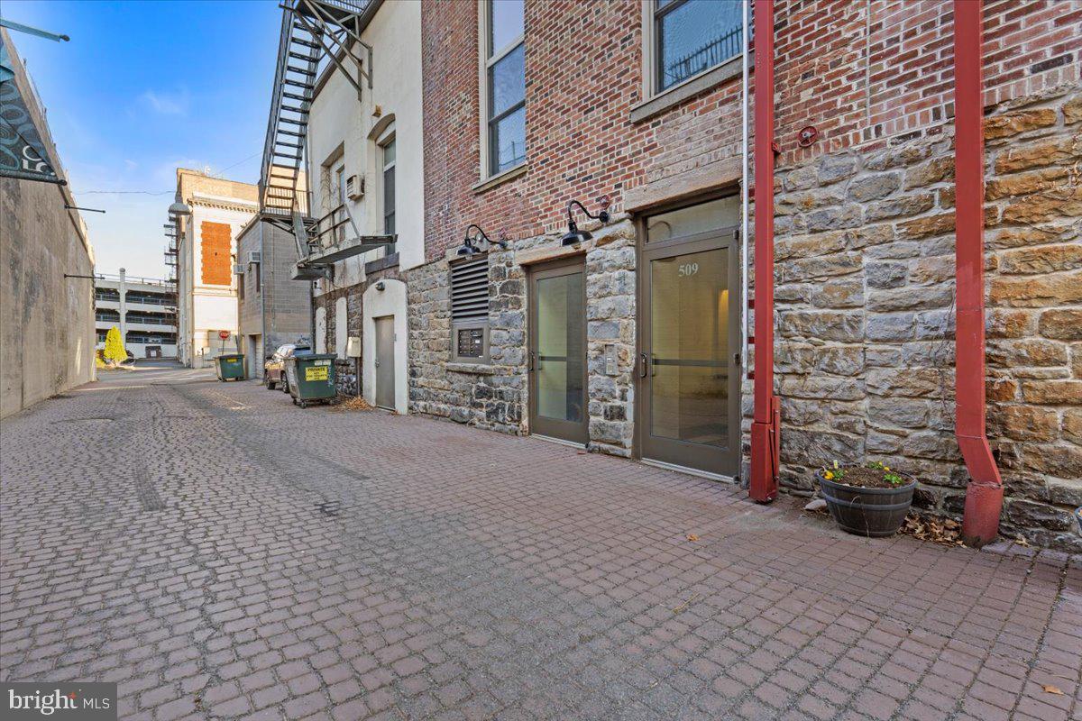 509 Bogart Place, Unit 202 Scranton, PA 18505 - Photo 27 of 43 Charming alleyway with rustic charm.
