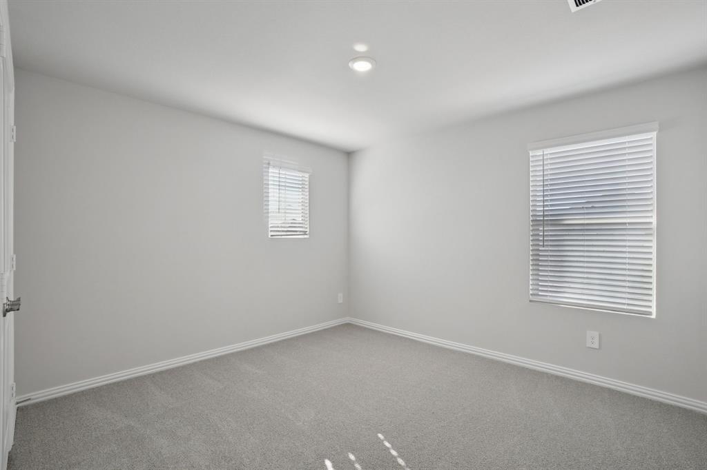 809 River Lane Lavon, TX 75166 - Photo 24 of 39 an empty room with a window