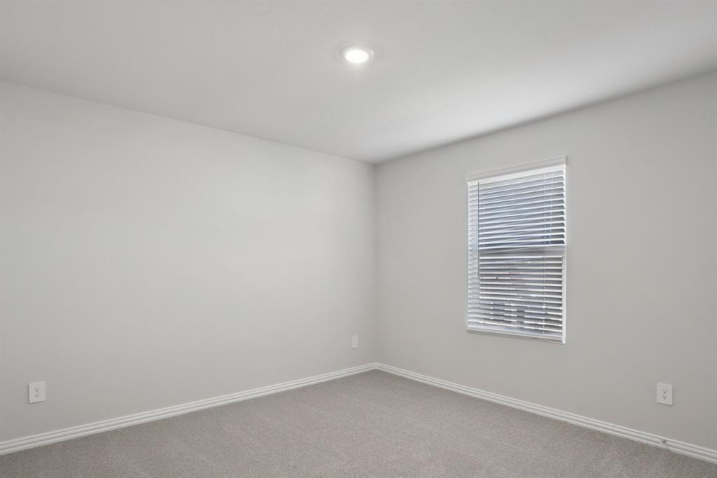 809 River Lane Lavon, TX 75166 - Photo 27 of 39 an empty room with a window
