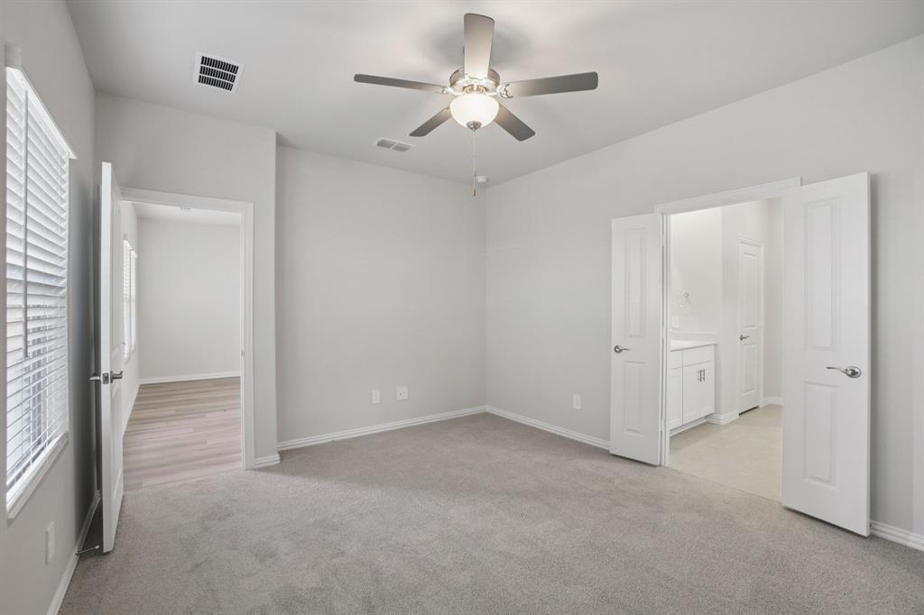 809 River Lane Lavon, TX 75166 - Photo 31 of 39 wooden floor in an empty room with a window