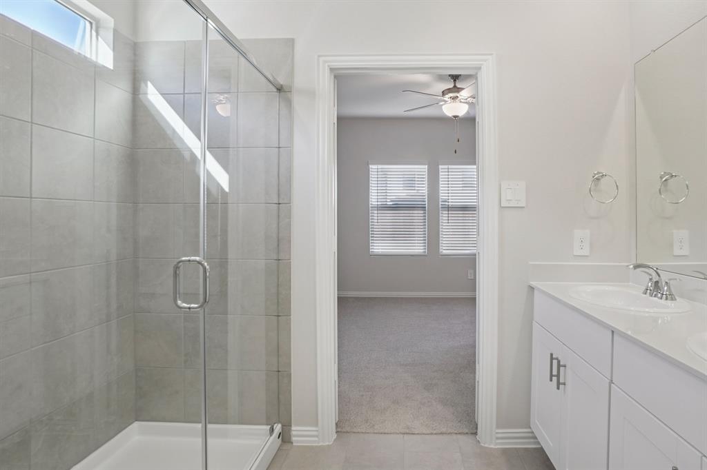 809 River Lane Lavon, TX 75166 - Photo 34 of 39 a bathroom with a shower and a sink