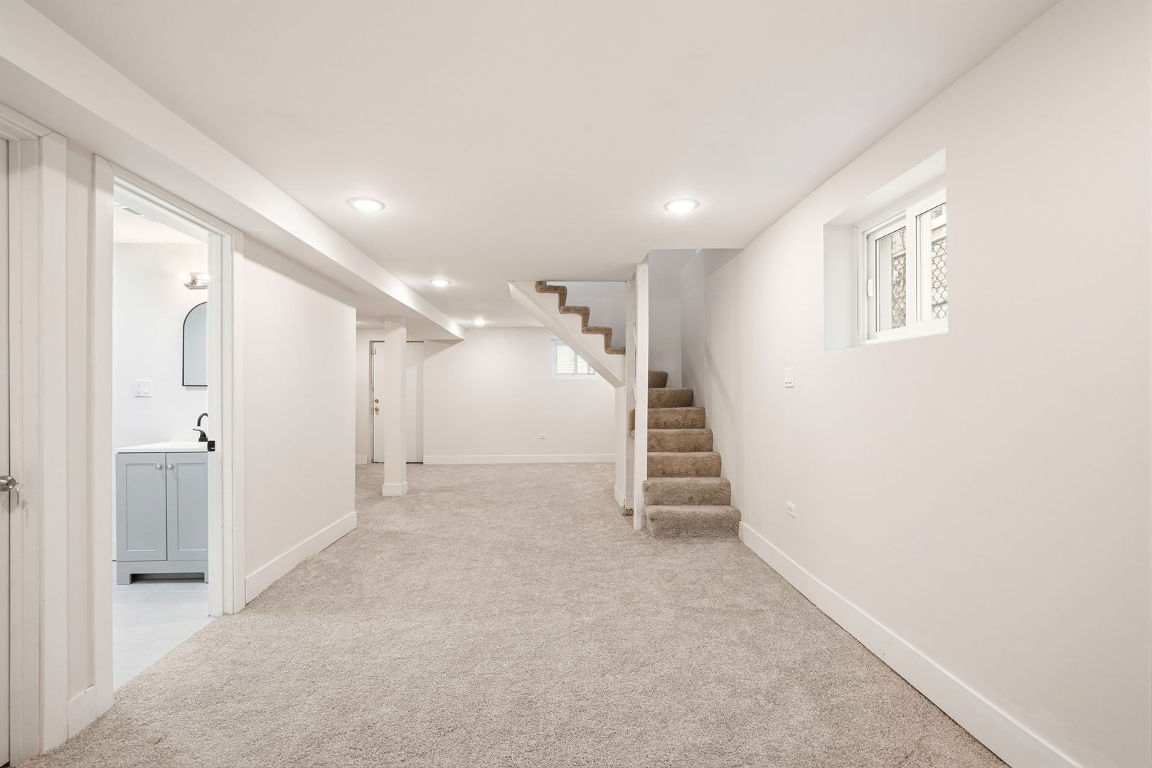 7955 South Colfax Avenue Chicago, IL 60617 - Photo 19 of 24 a view of a hallway with staircase