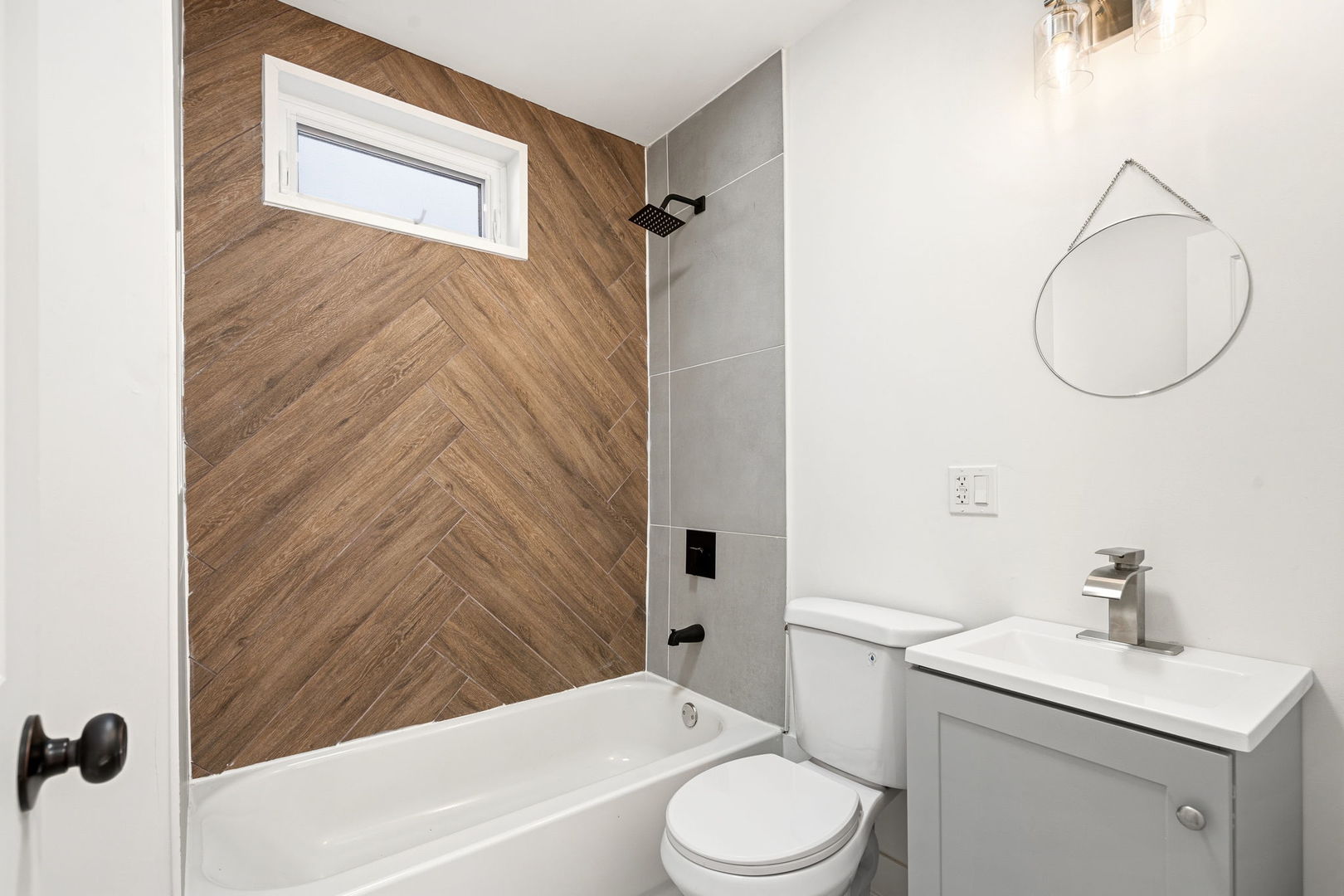 7955 South Colfax Avenue Chicago, IL 60617 - Photo 21 of 24 a bathroom with a sink toilet and shower