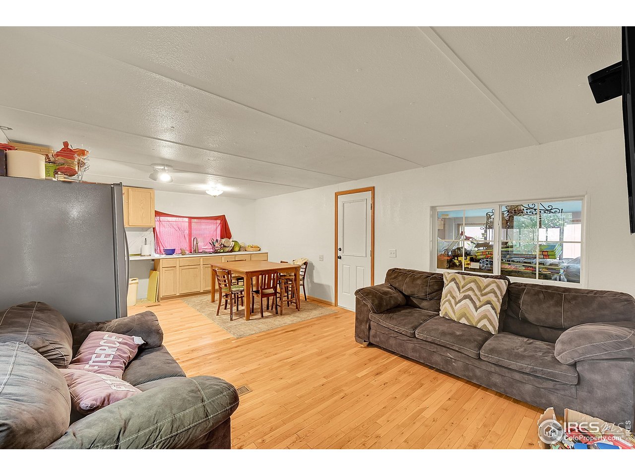 2500 East Harmony Road, Unit 178 Fort Collins, CO 80528 - Photo 2 of 22 a living room with furniture and a couch