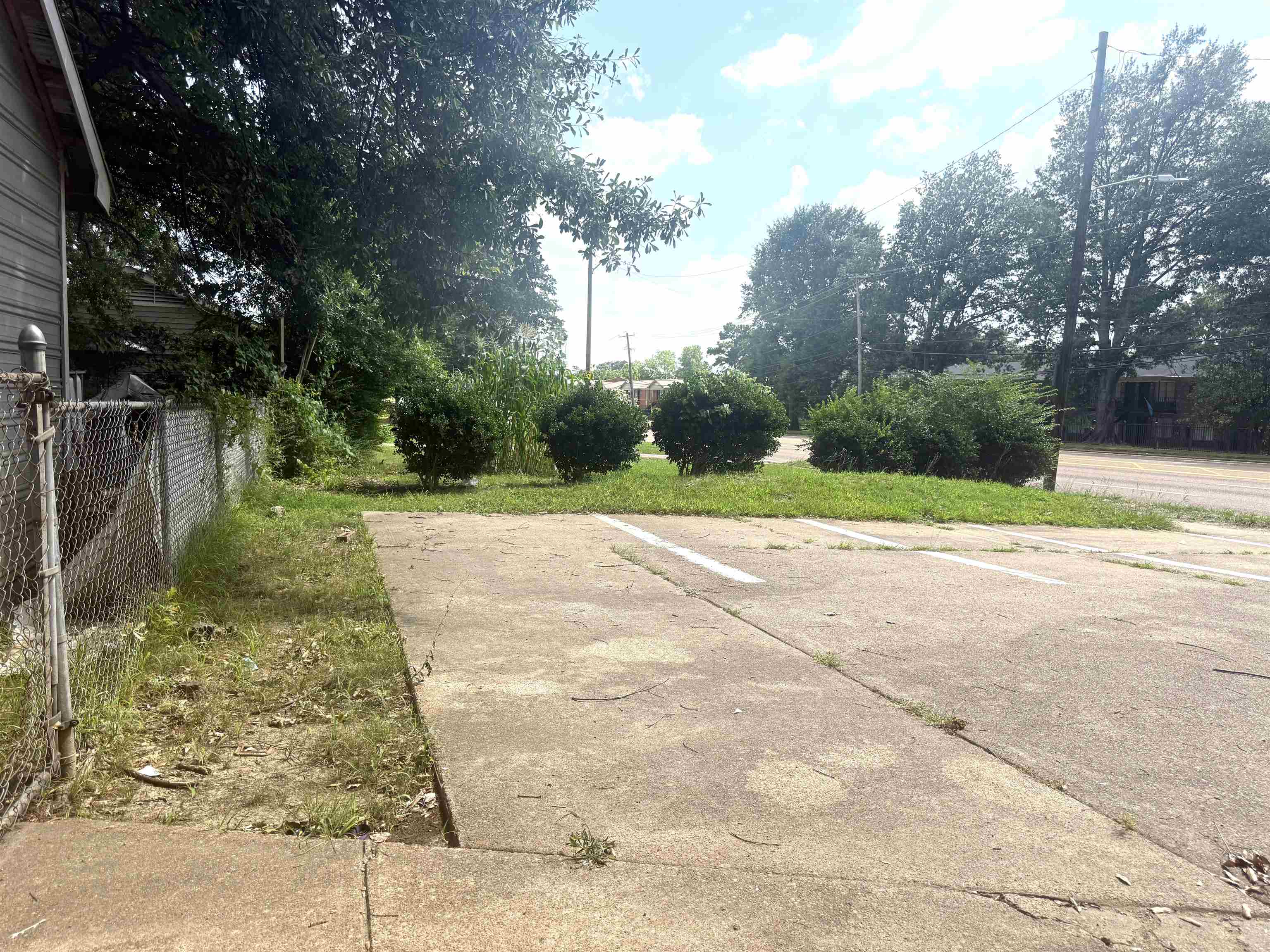 2930 Getwell Road Memphis, TN 38118 - Photo 24 of 25 Concrete paved area with visible parking space markings