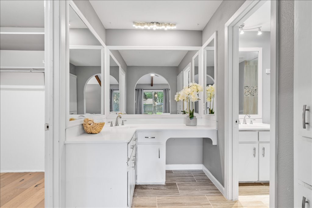 3402 Saddlestring Trail Austin, TX 78739 - Photo 24 of 33 Bathroom with vanity and wood finish floors