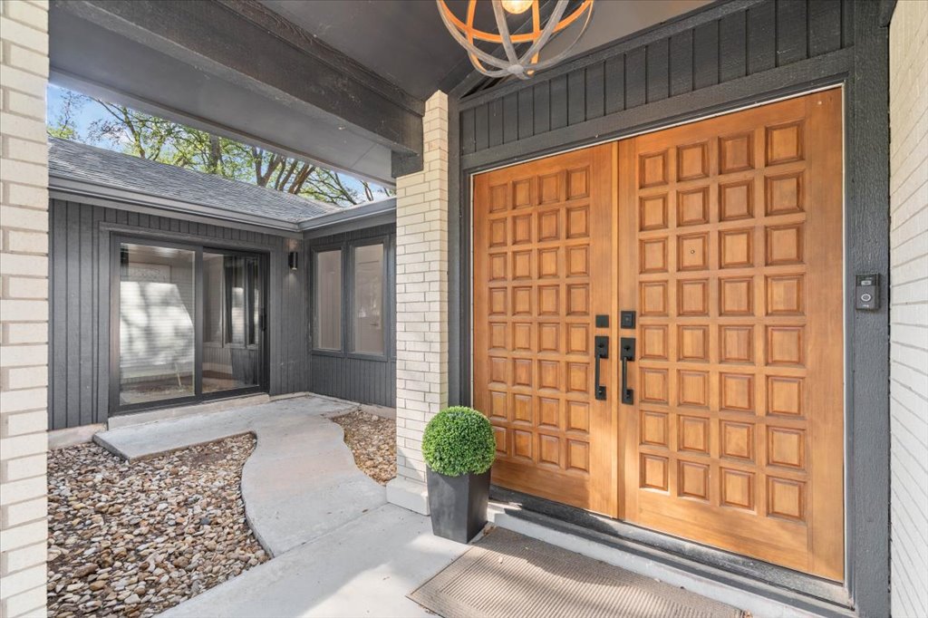 3402 Saddlestring Trail Austin, TX 78739 - Photo 7 of 33 Entrance to property featuring roof with shingles