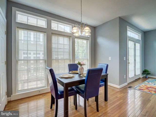 a bathroom with a sink toilet and a mirror