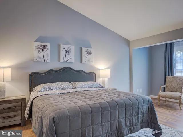 a bathroom with a sink a mirror and a vanity