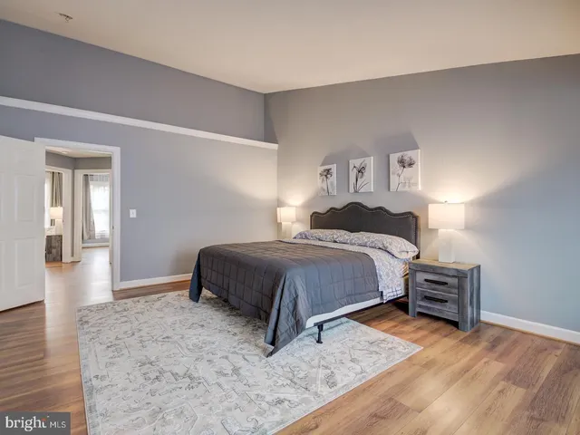 a white bath tub sitting next to a window