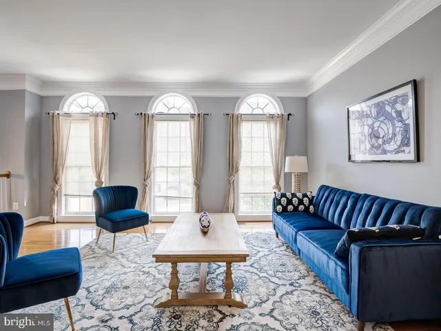 a living room with furniture and a couch