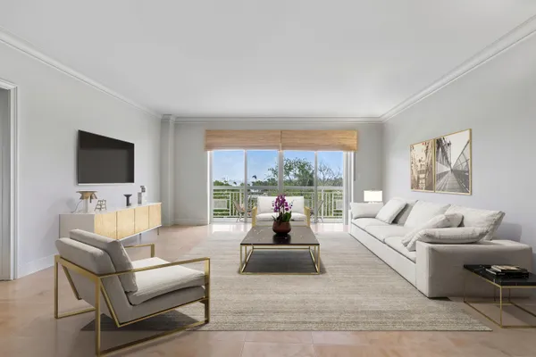a living room with furniture or couch and a flat screen tv