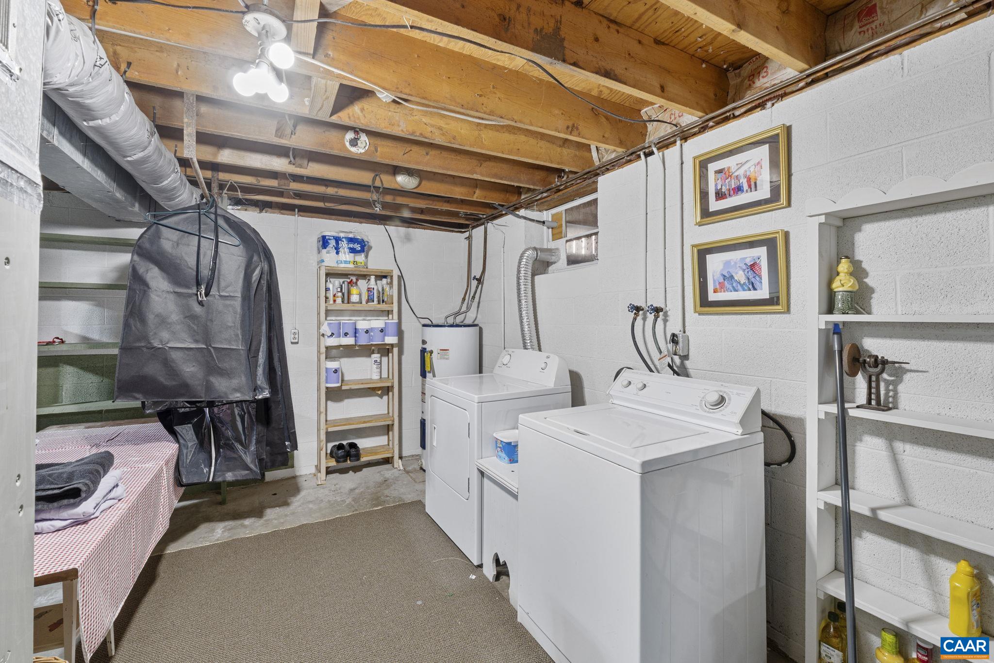 9020 West River Road Palmyra, VA 22963 - Photo 18 of 41 a storage room with washer and dryer