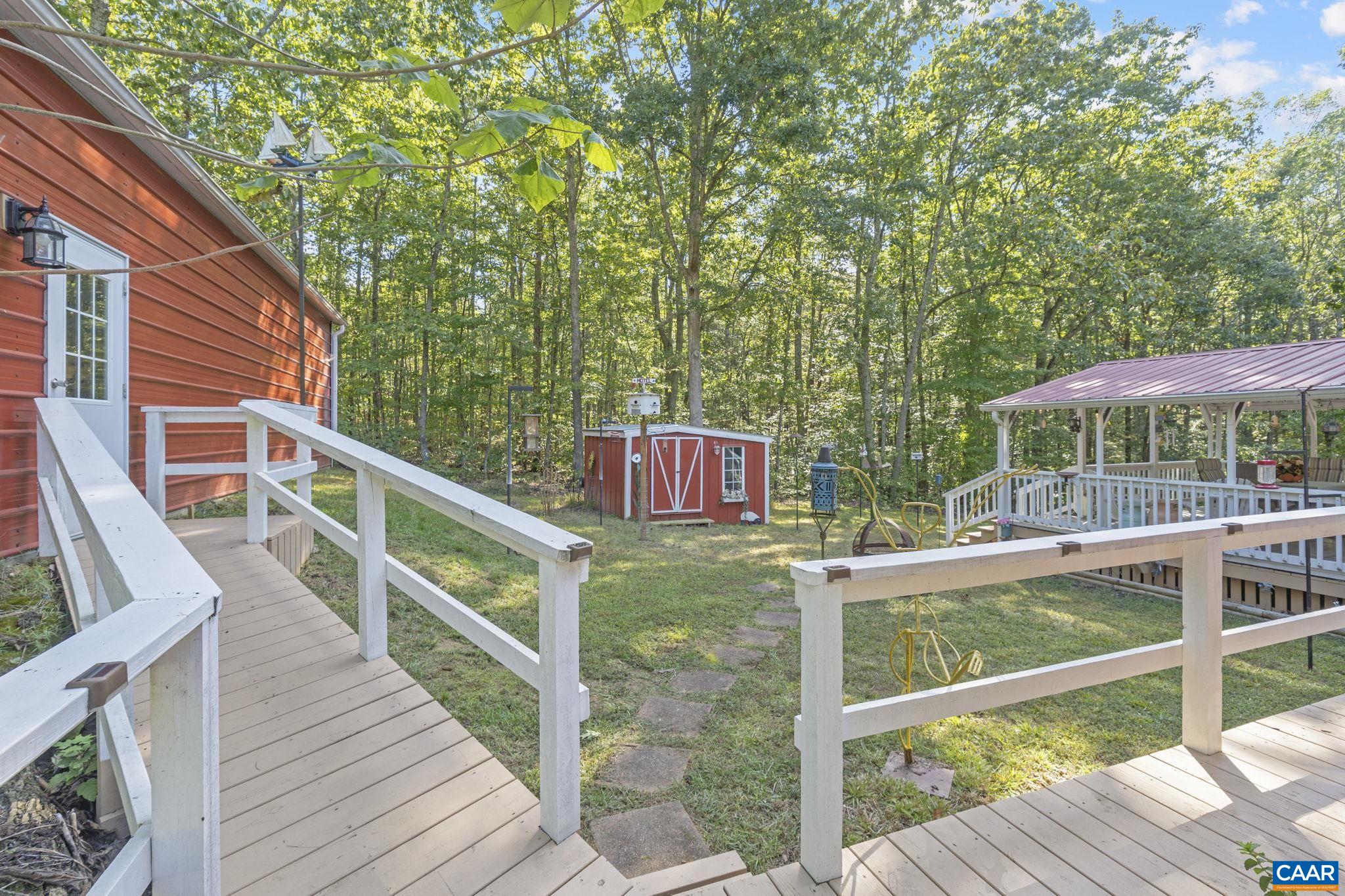 9020 West River Road Palmyra, VA 22963 - Photo 26 of 41 a view of balcony with wooden floor and seating space