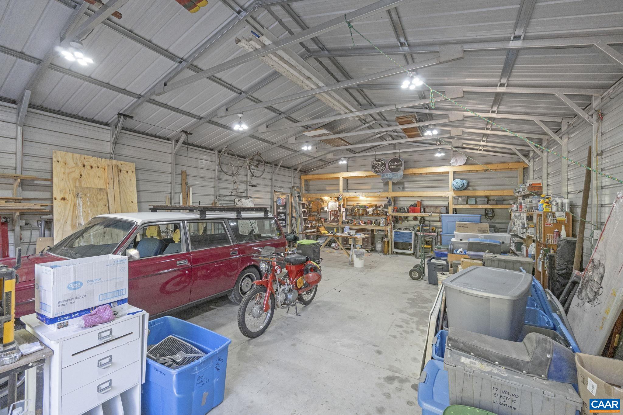 9020 West River Road Palmyra, VA 22963 - Photo 28 of 41 a view of a storage room with lots of stuff
