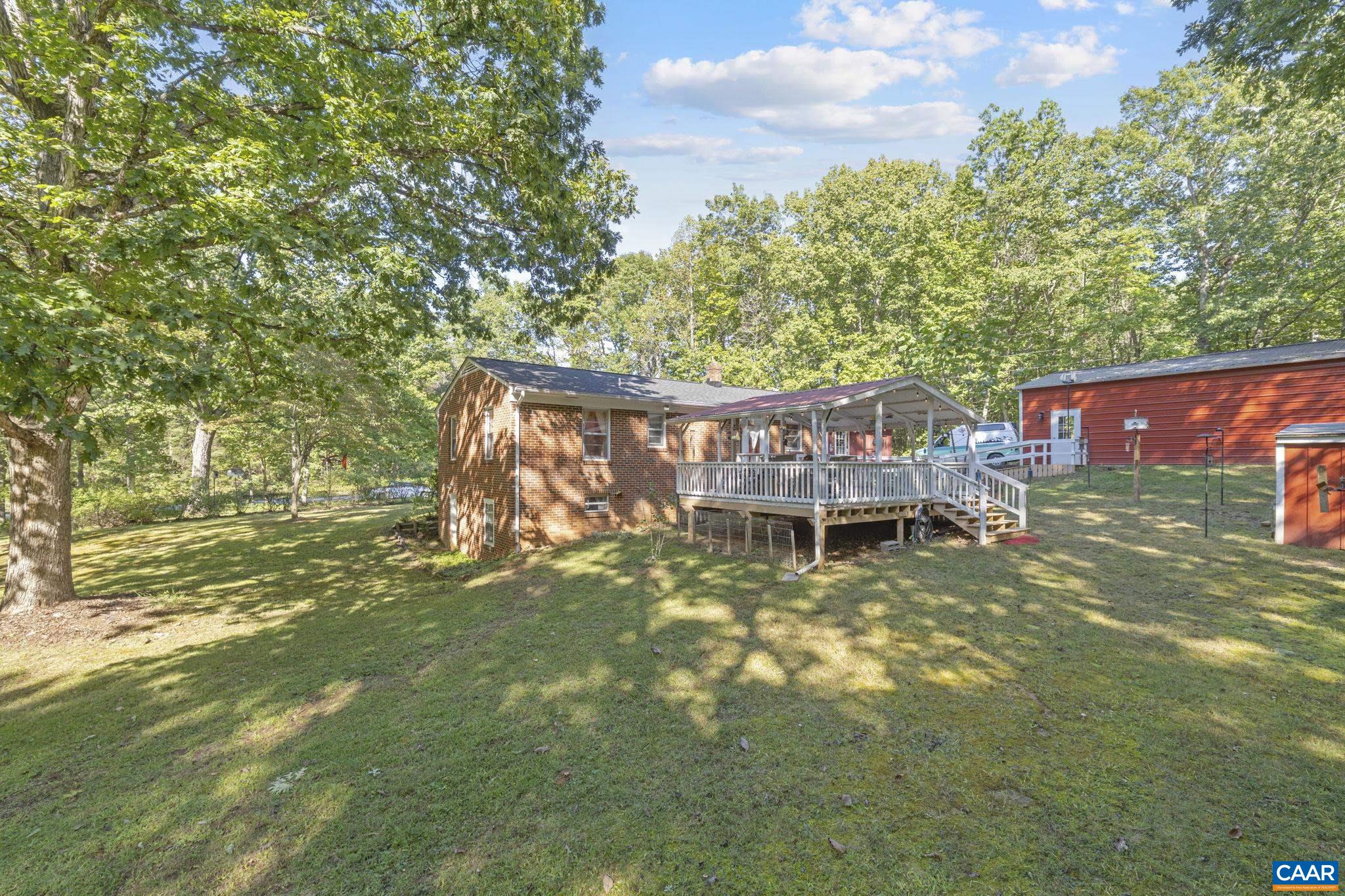 9020 West River Road Palmyra, VA 22963 - Photo 31 of 41 a view of a house with a yard