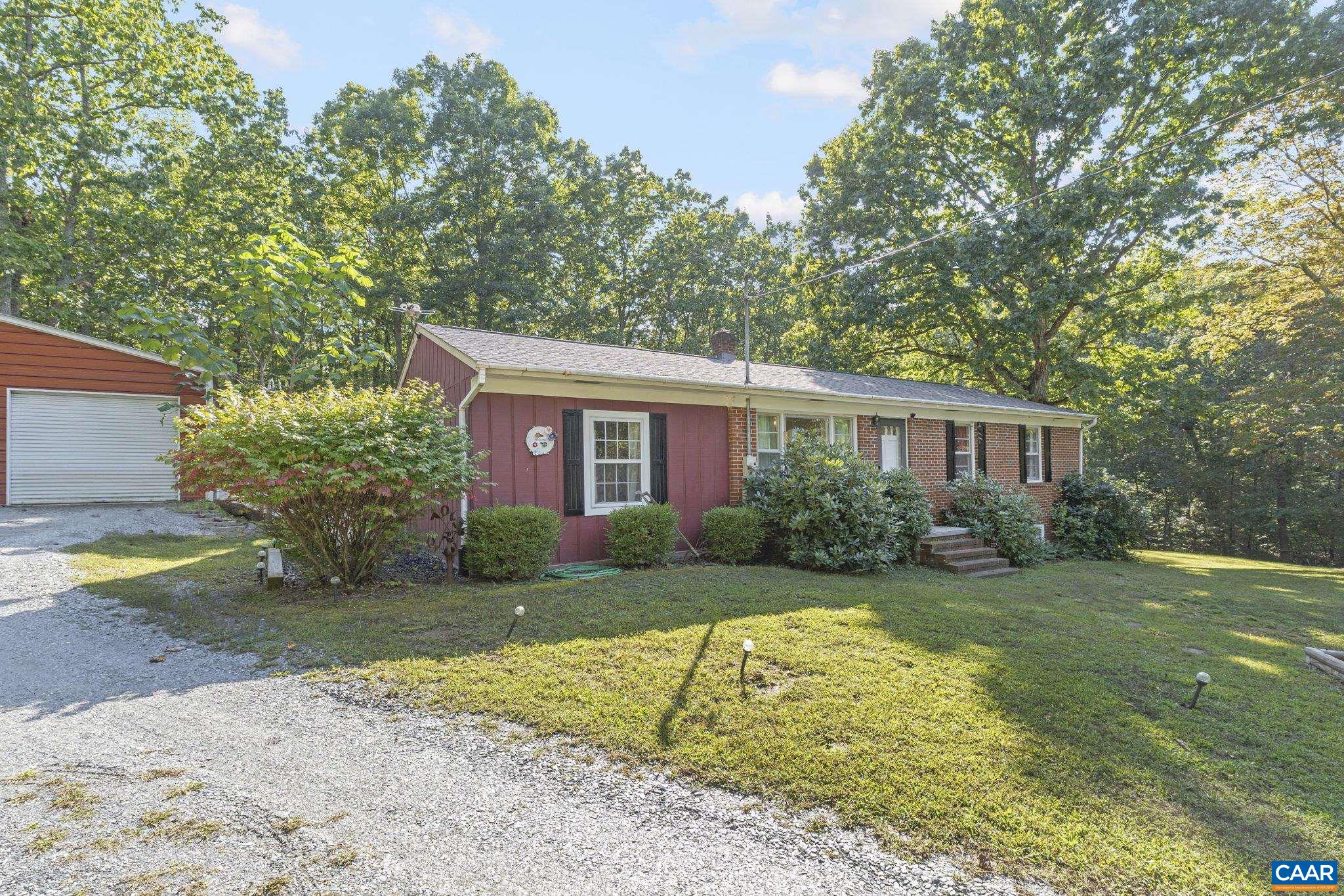 9020 West River Road Palmyra, VA 22963 - Photo 38 of 41 a view of a yard with plants and large tree