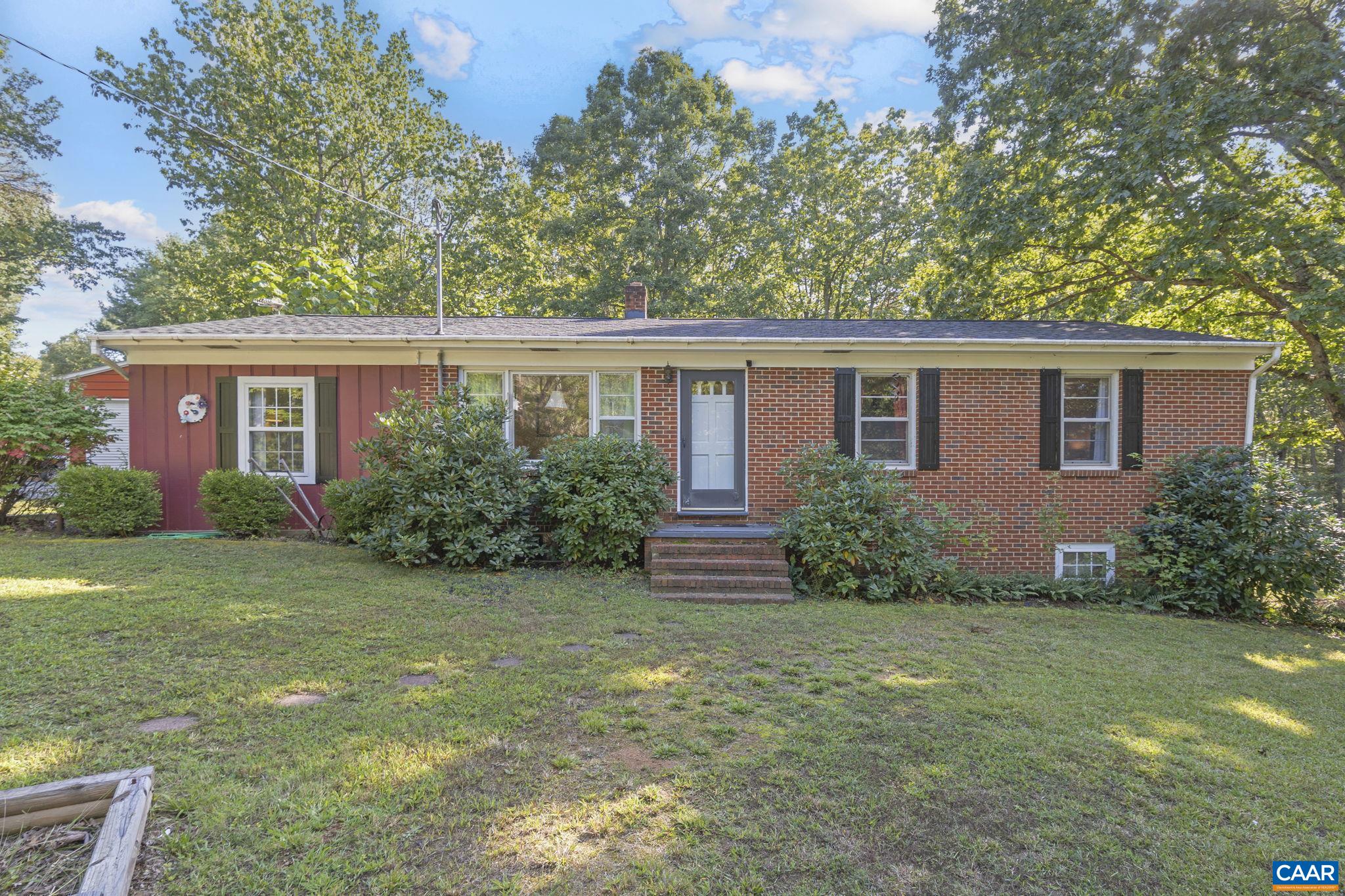9020 West River Road Palmyra, VA 22963 - Photo 39 of 41 front view of a house with a yard