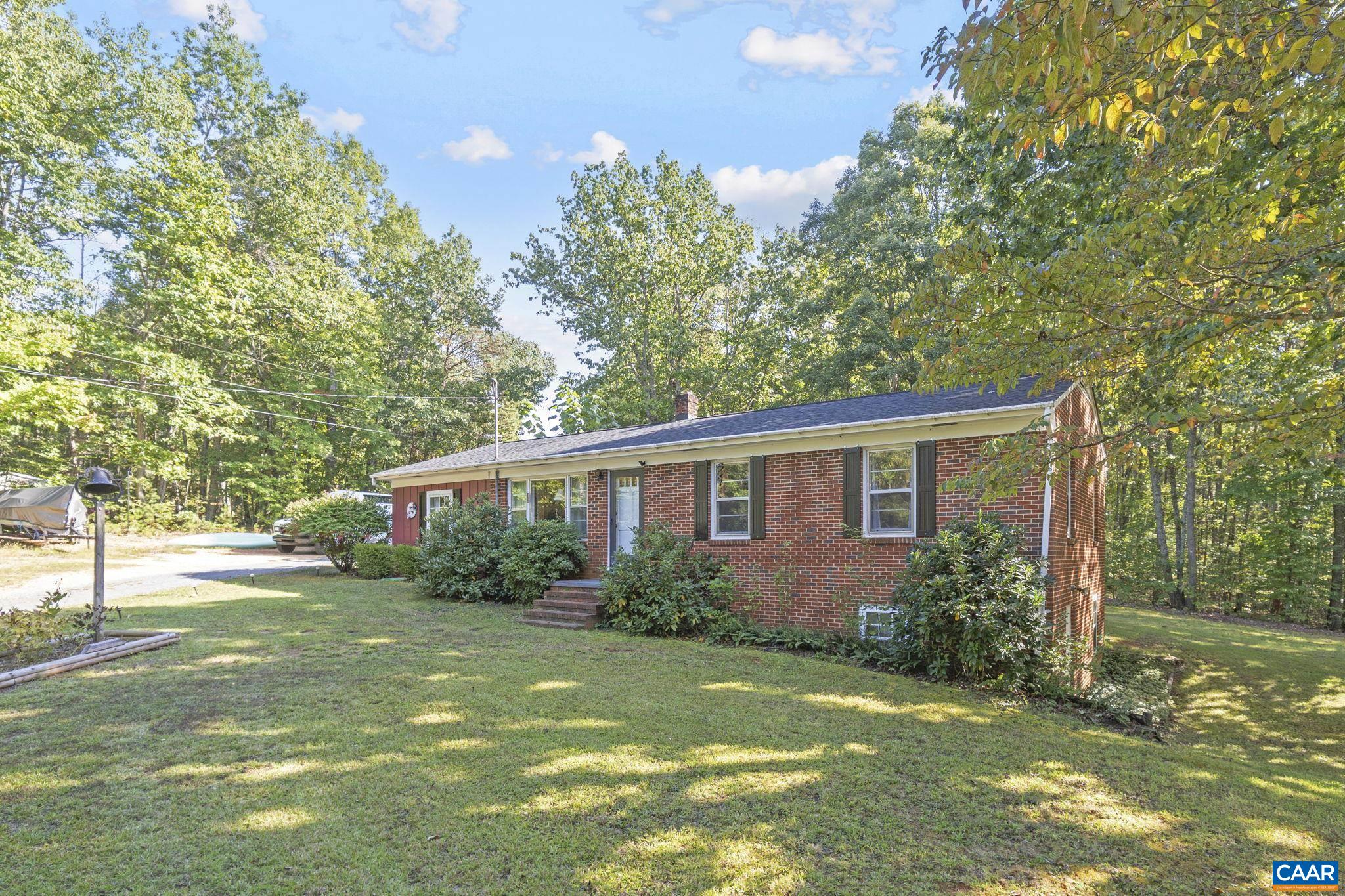 9020 West River Road Palmyra, VA 22963 - Photo 40 of 41 a view of backyard of house with green space