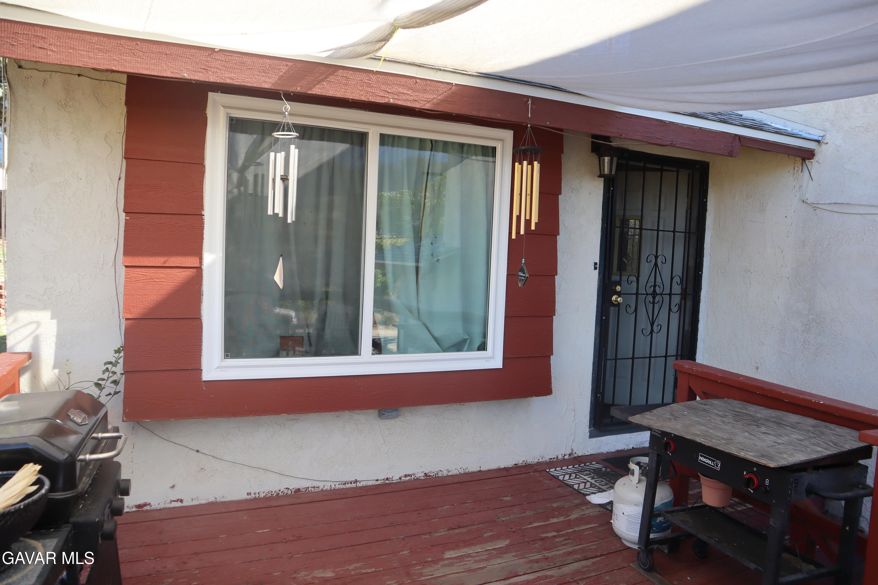 14955 Elizabeth Lake Road Lake Hughes, CA 93532 - Photo 5 of 17 a view of a house with a wooden floor and a window