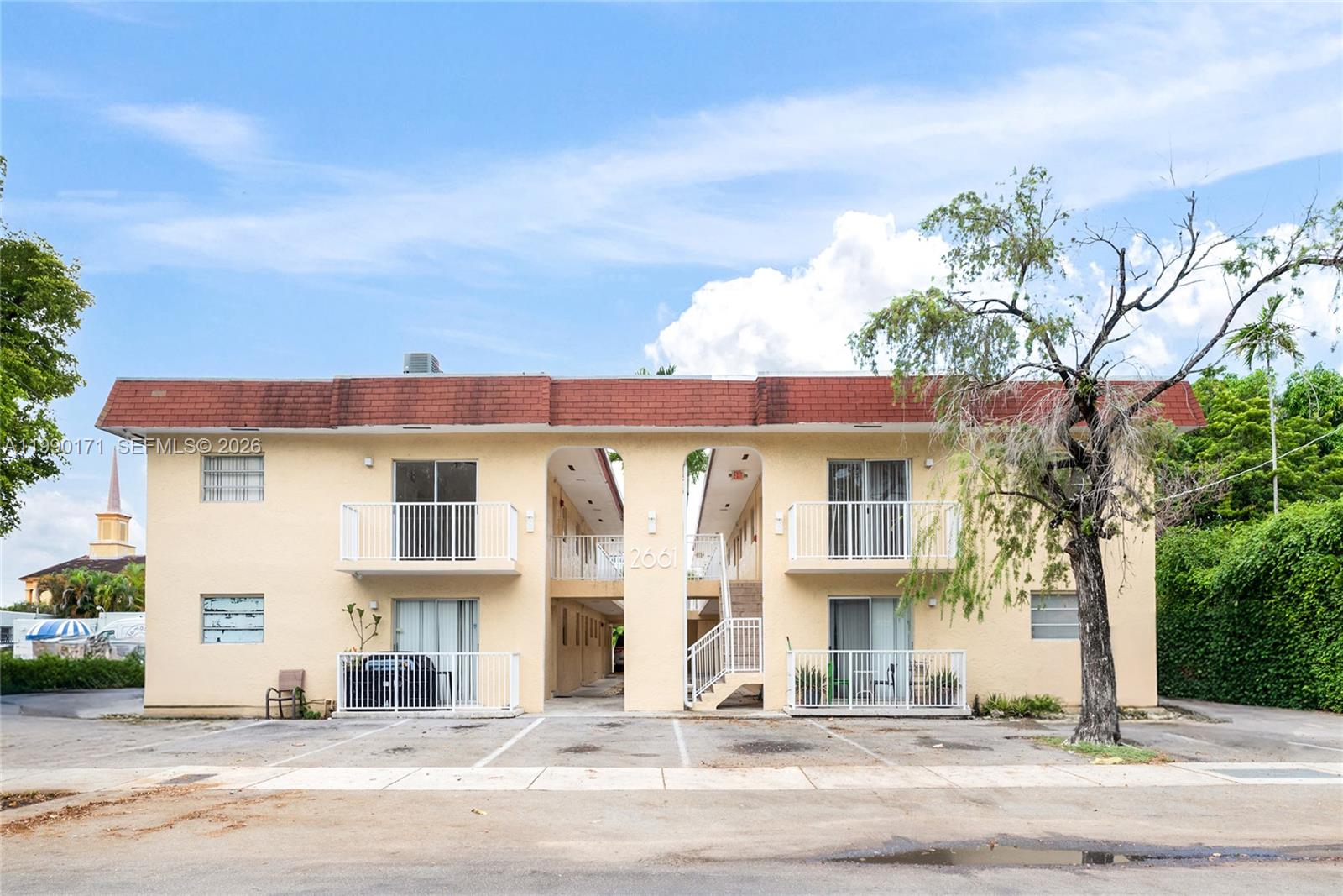 2661 Southwest 11th Street, Unit 8 Miami, FL 33135 - Photo 3 of 9 front view of a house with a street