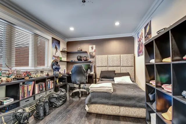 a living room with furniture a flat screen tv and a large window