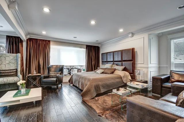 a bed room with bed and a window