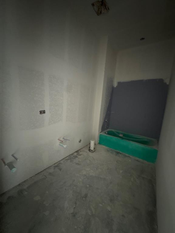 8861 County Road 623 Blue Ridge, TX 75424 - Photo 12 of 17 an empty room with a wooden door