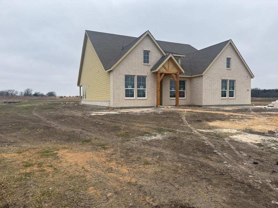 8861 County Road 623 Blue Ridge, TX 75424 - Photo 3 of 17 a front view of a house with a yard