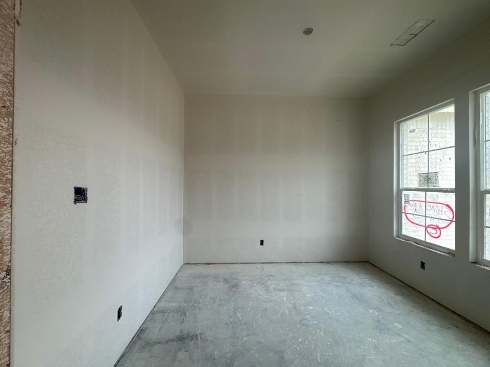 8861 County Road 623 Blue Ridge, TX 75424 - Photo 5 of 17 an empty room with a window