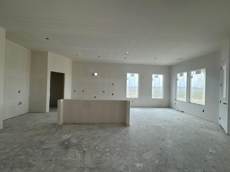 8861 County Road 623 Blue Ridge, TX 75424 - Photo 8 of 17 an empty room with windows