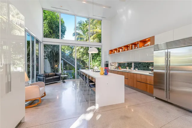 a bedroom with furniture and a book shelf