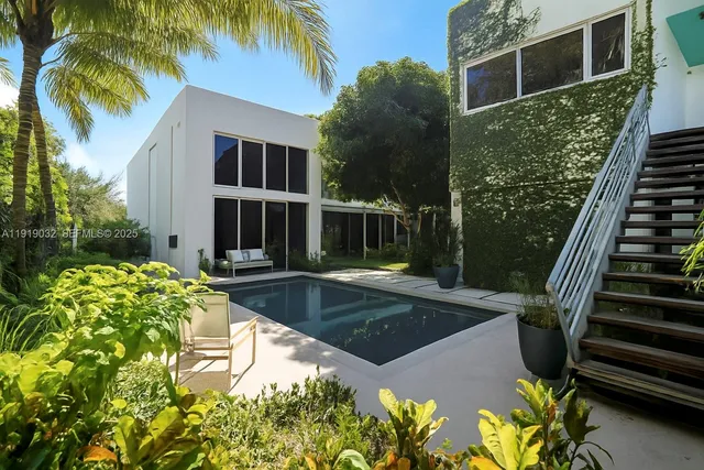 a view of yard with patio