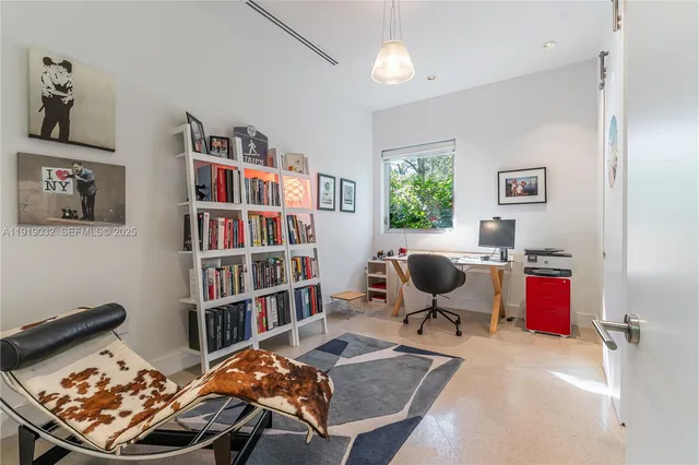 a bedroom with furniture and a bed