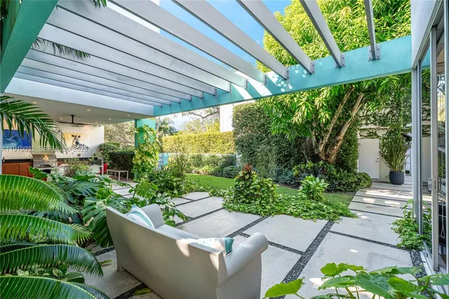 a view of a patio with swimming pool