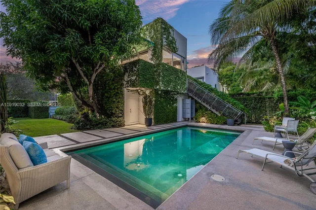 a view of a backyard with plants