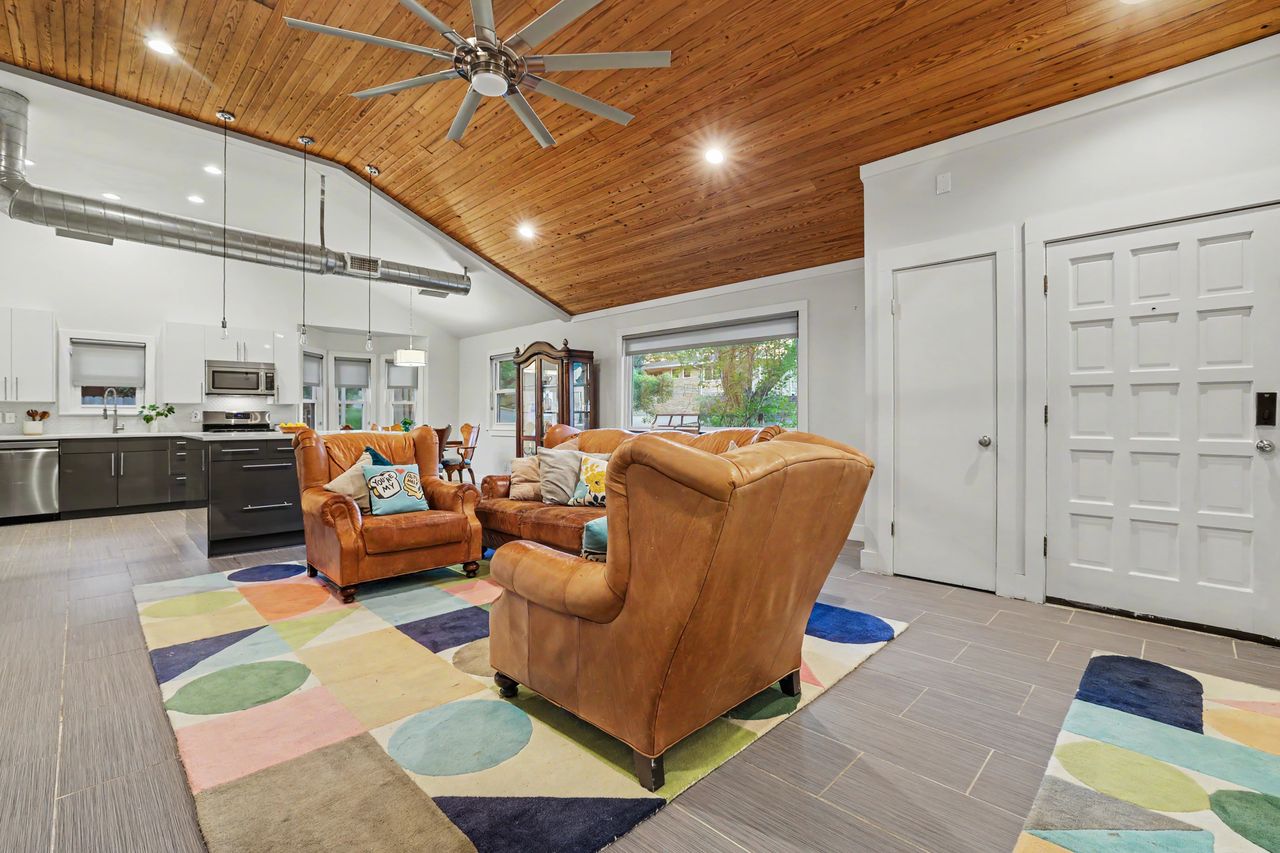 6903 Ardath Street Austin, TX 78757 - Photo 11 of 40 Living room featuring a vaulted wooden ceiling, recessed lighting, a ceiling fan, and light wood-type flooring