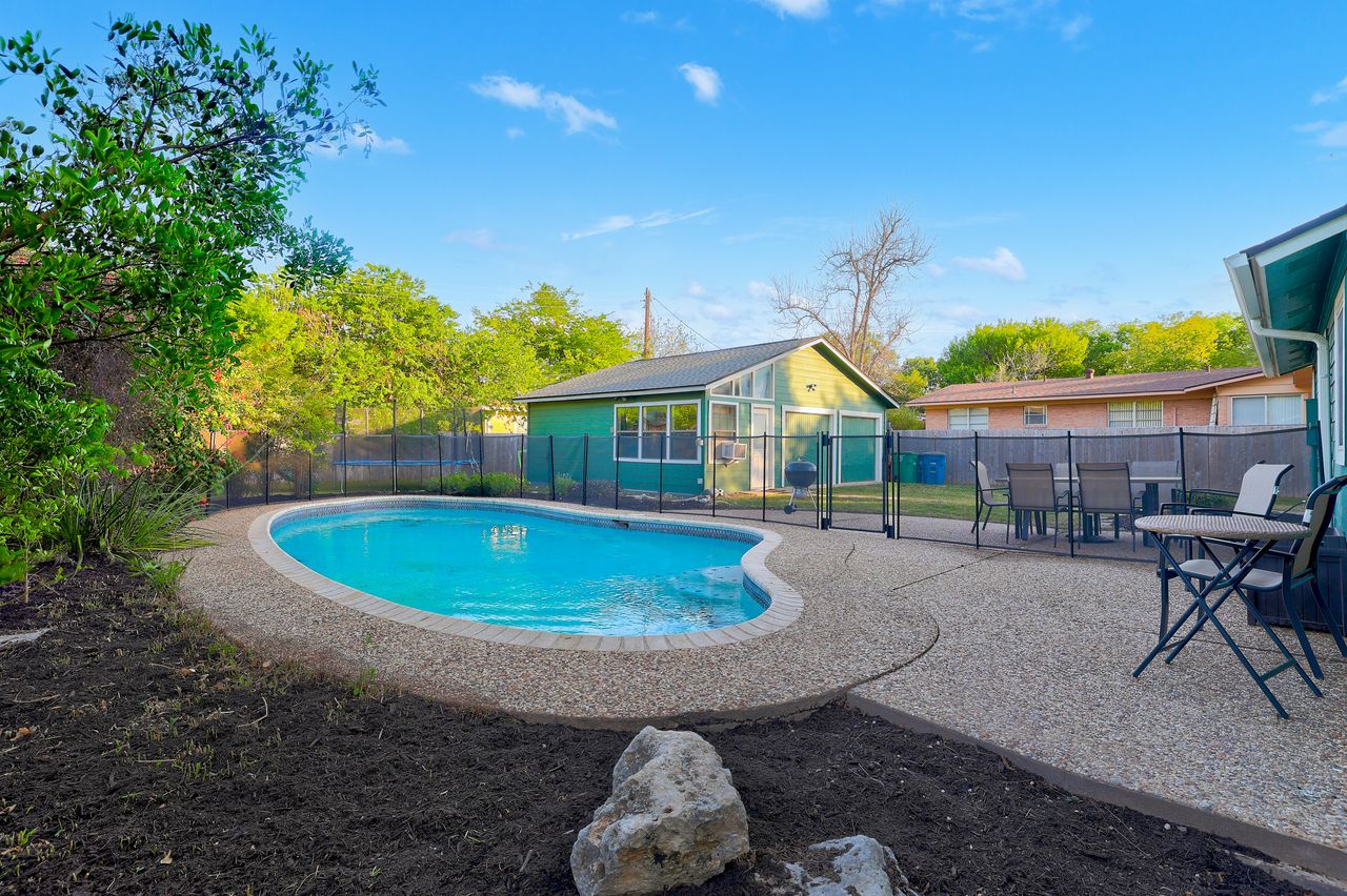 6903 Ardath Street Austin, TX 78757 - Photo 35 of 40 View of swimming pool featuring patio surround