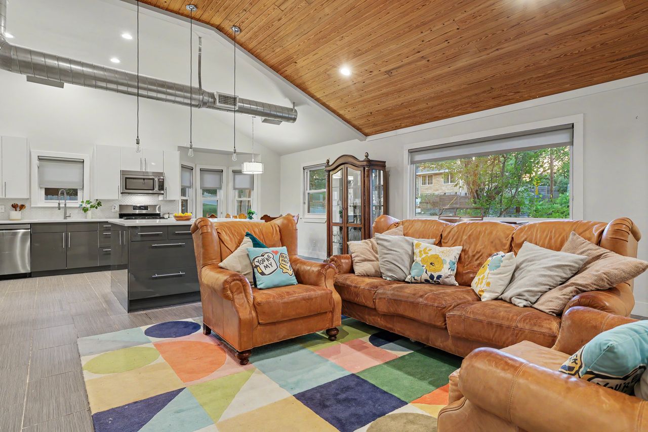 6903 Ardath Street Austin, TX 78757 - Photo 9 of 40 Living area featuring a vaulted wood ceiling, recessed lighting, and light wood-style floors