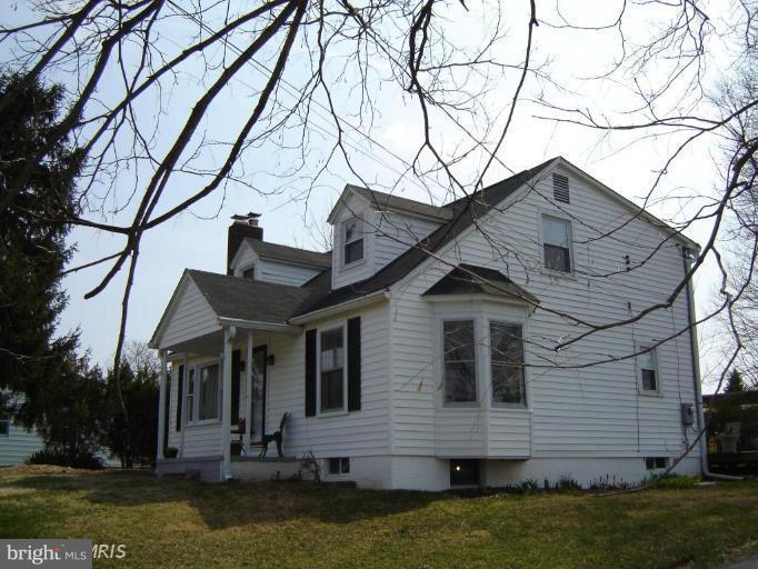 15312 Old Hanover Road Upperco, MD 21155 - Photo 1 of 19 a front view of a house with a yard