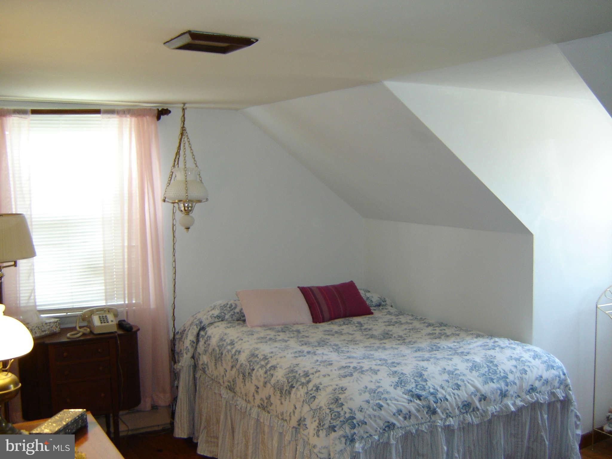 15312 Old Hanover Road Upperco, MD 21155 - Photo 14 of 19 a bedroom with a bed and a window