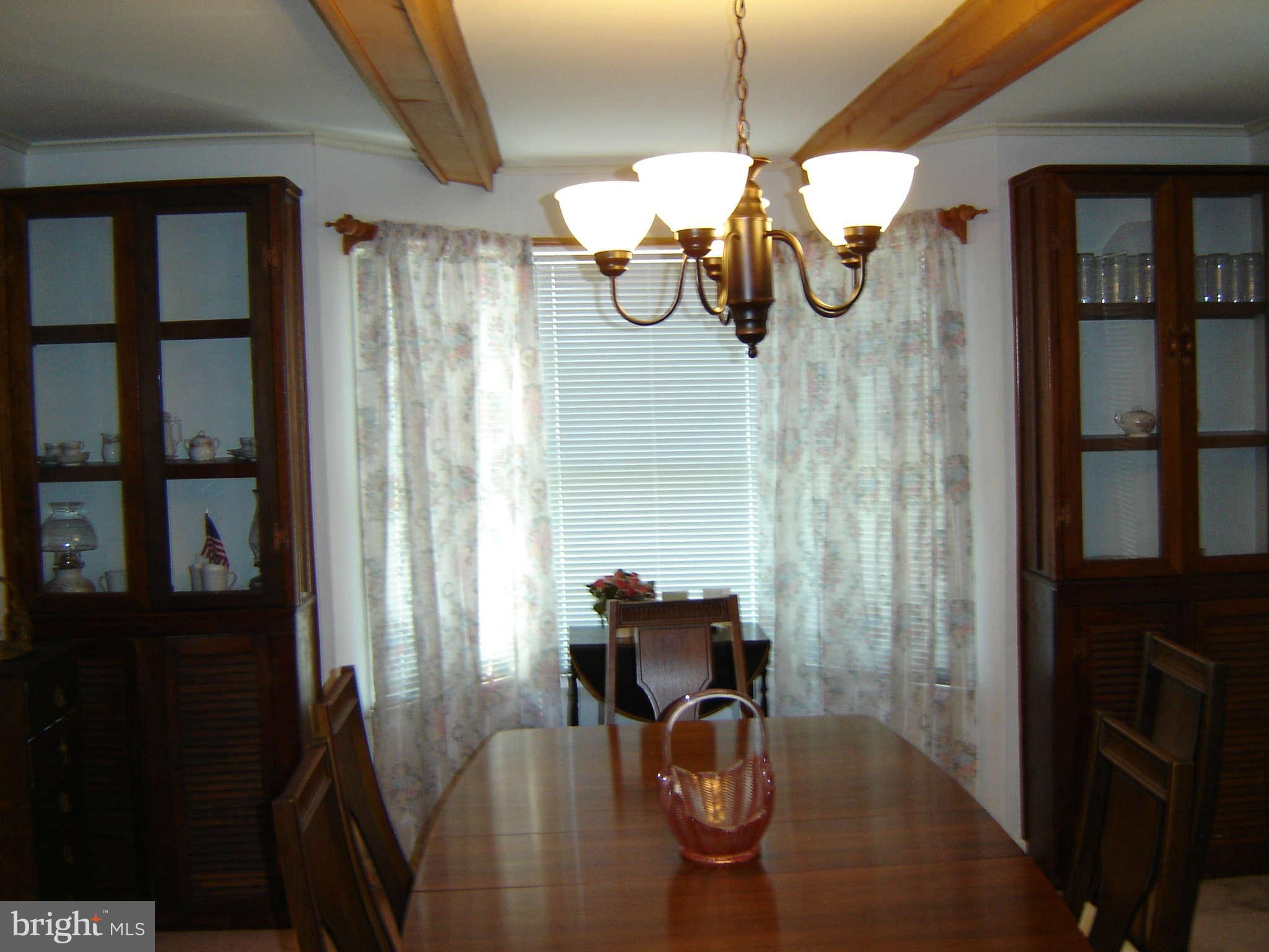 15312 Old Hanover Road Upperco, MD 21155 - Photo 4 of 19 a view of entryway and hall with wooden floor