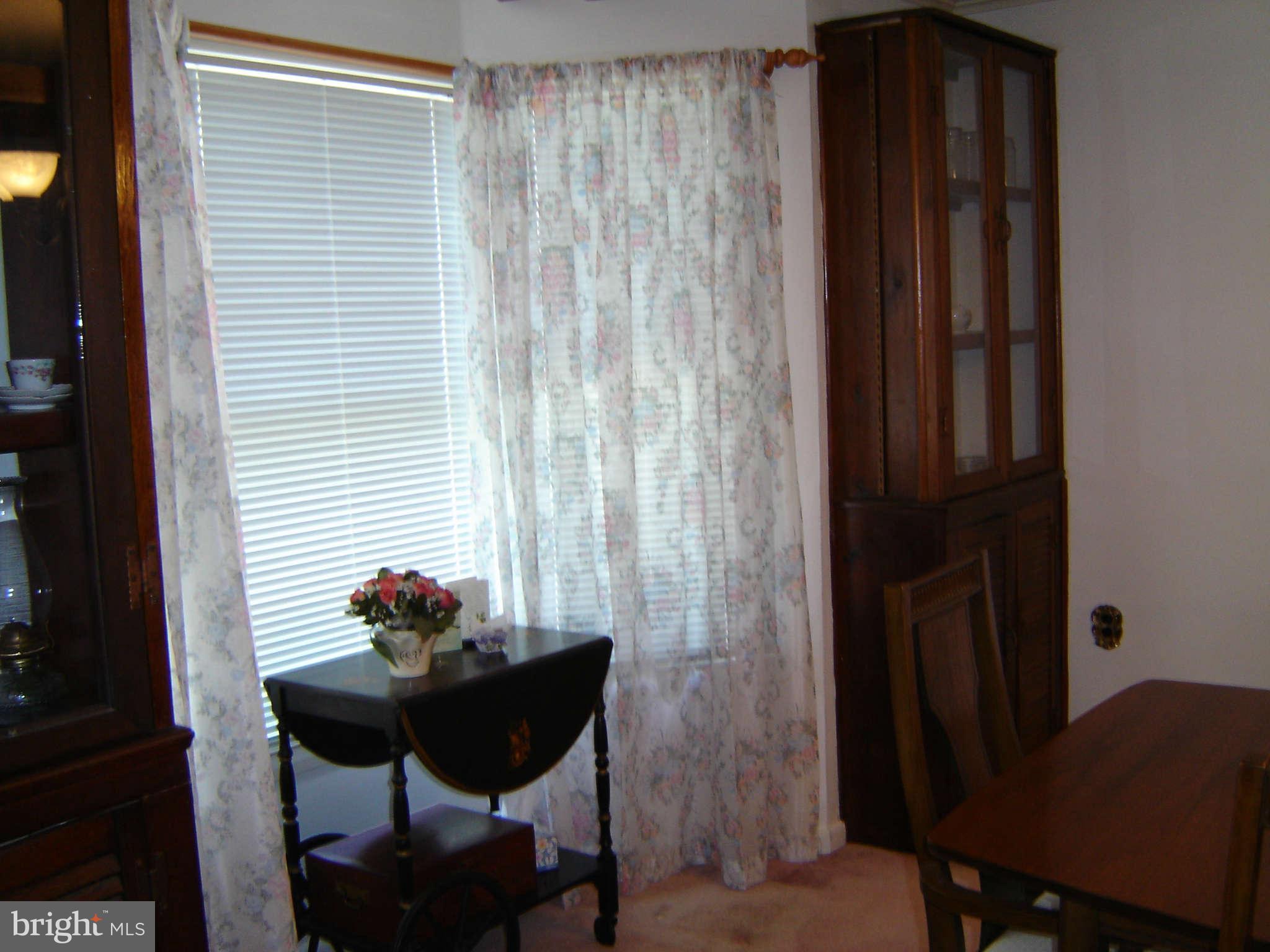 15312 Old Hanover Road Upperco, MD 21155 - Photo 5 of 19 a table and chair in a room