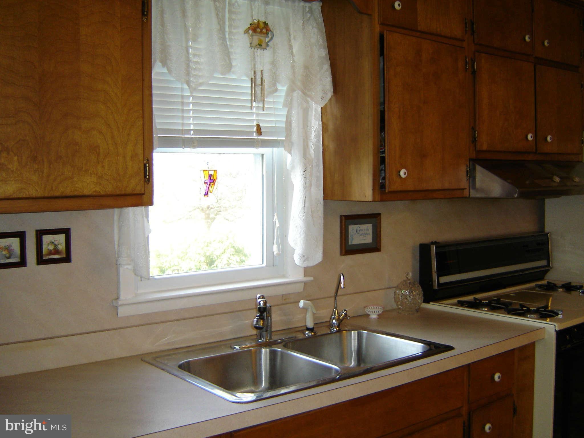 15312 Old Hanover Road Upperco, MD 21155 - Photo 8 of 19 a kitchen with a sink and cabinets