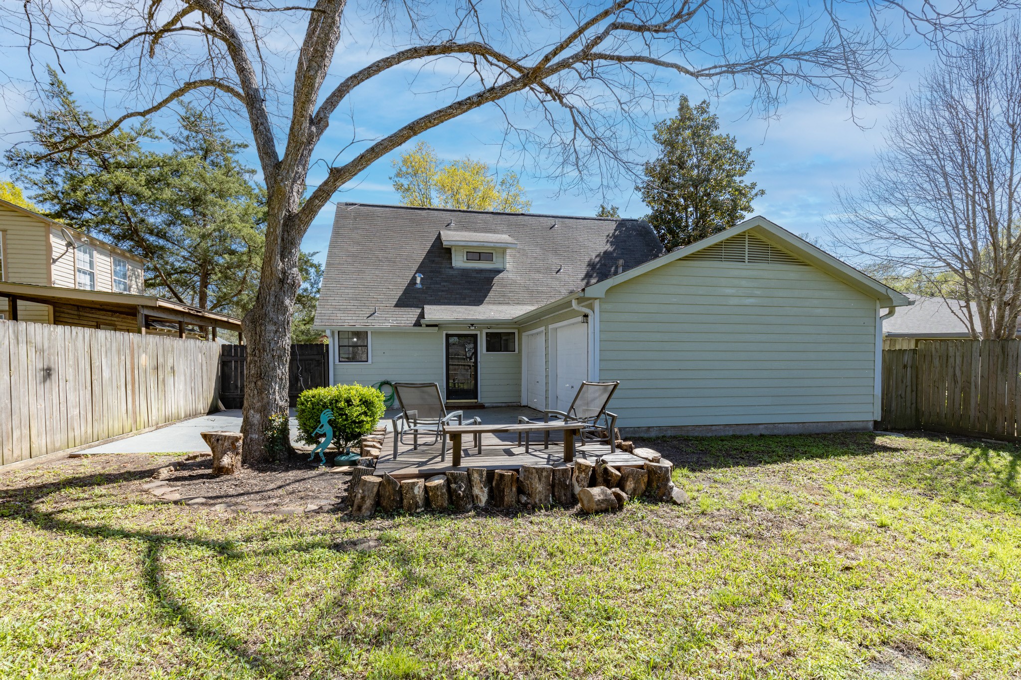 504 Percival Street, Unit A Tomball, TX 77375 - Photo 22 of 26 a view of a house with backyard and sitting area