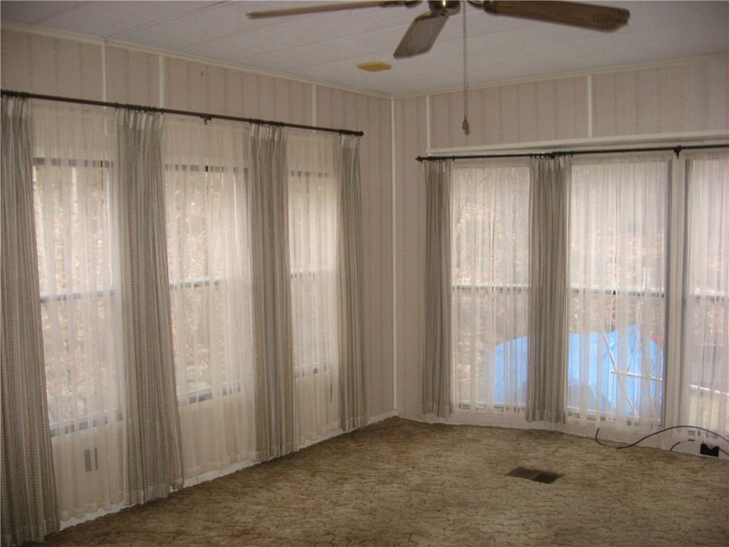 15 Dawes Hill Road Harrison, ME 04040 - Photo 6 of 23 Bright and airy living room with...