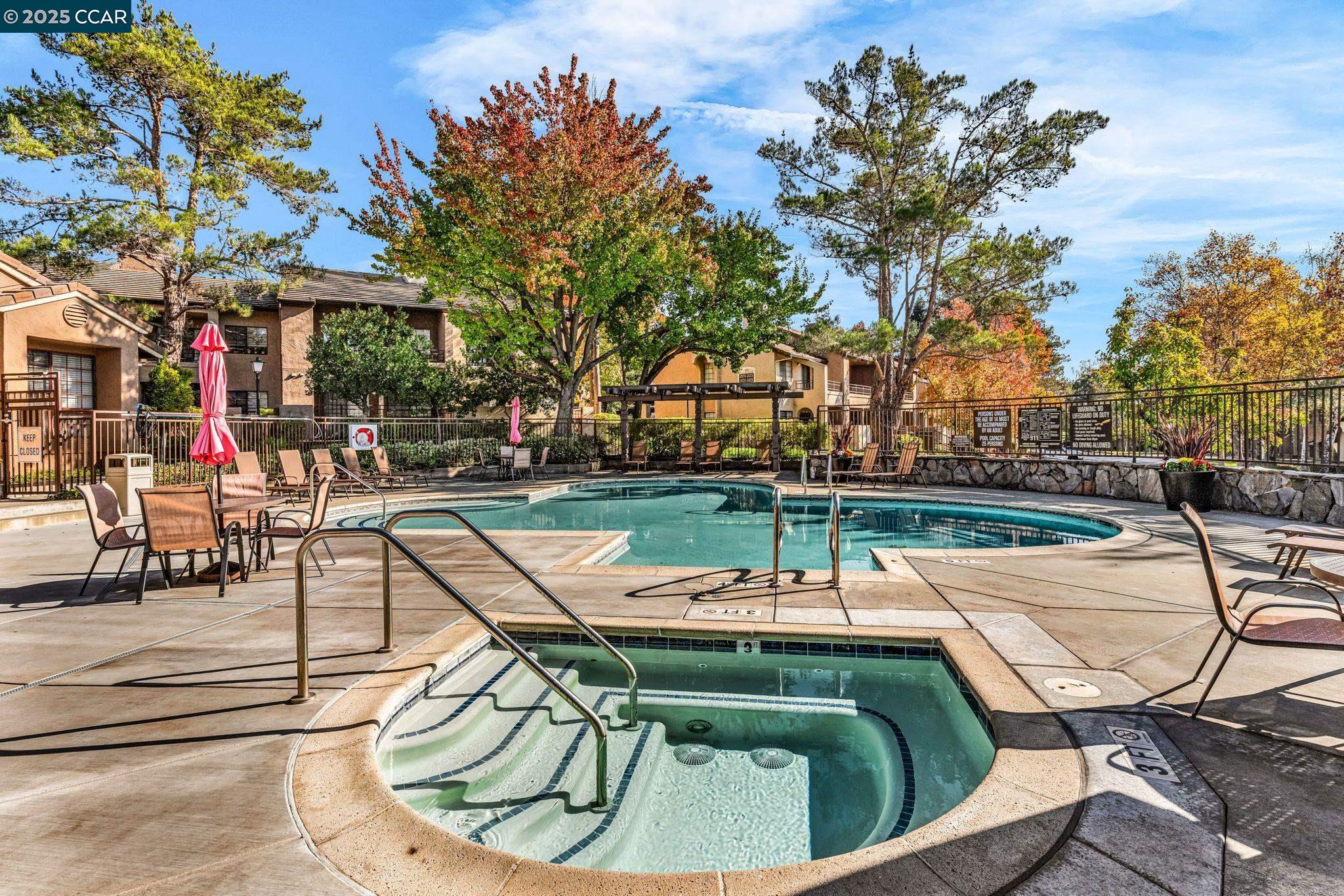 440 Canyon Woods Place, Unit C San Ramon, CA 94582 - Photo 15 of 17 a patio with tables and chairs